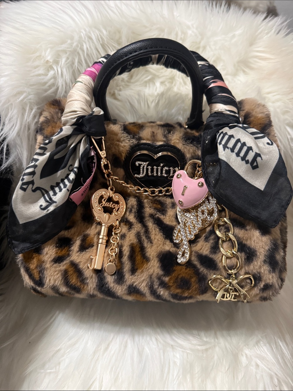 Viral  Juicy Couture Leopard Faux Fur Satchel purse, charms and scarf included